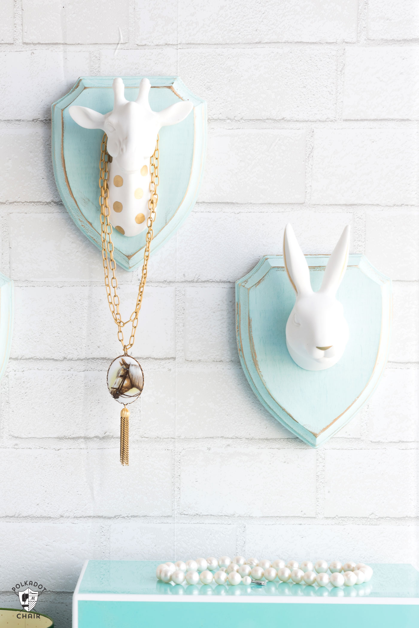 Cute and Whimsical DIY Jewelry Hangers made with wood plaques and animal heads; a creative way to display your jewelry