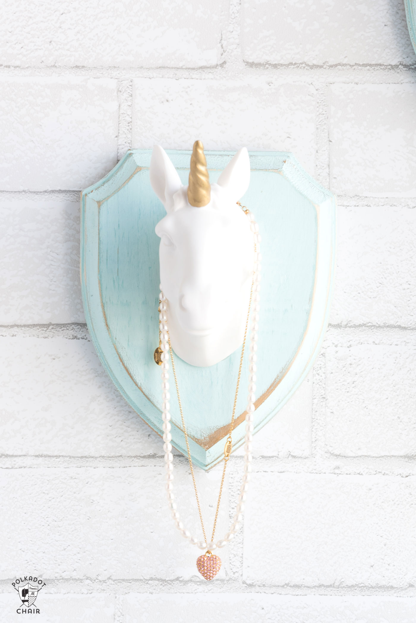 Cute and Whimsical DIY Jewelry Hangers made with wood plaques and animal heads; a creative way to display your jewelry