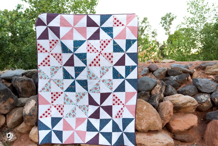 Summertime Pinwheel Quilt - so easy you can make it with a bunch of layer cakes or 10" stackers. A simple summer quilt to make