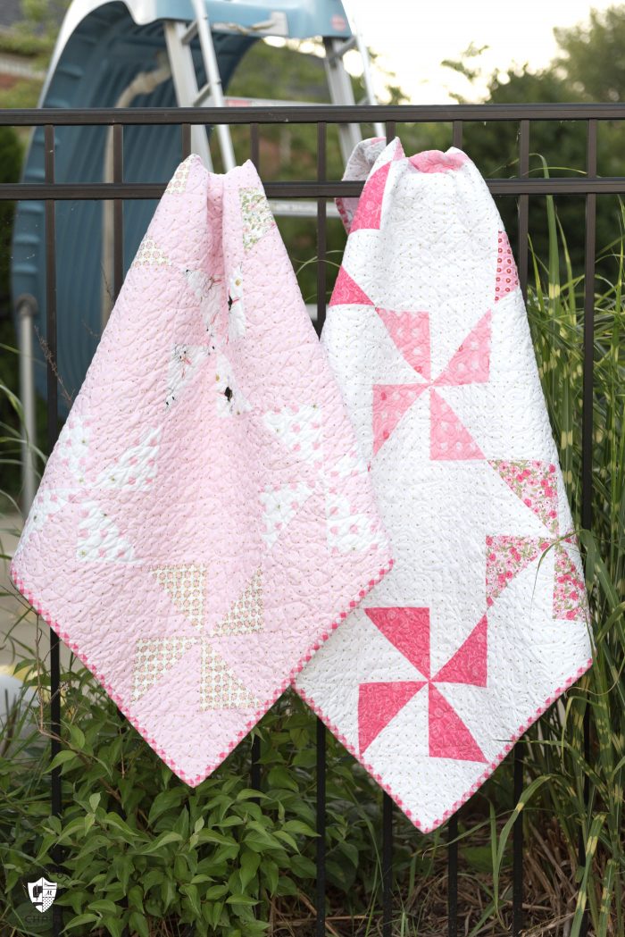 Free baby quilt patterns including this one for a simple baby quilt made using a Turnstile Quilt block! So easy you could make it in a day.