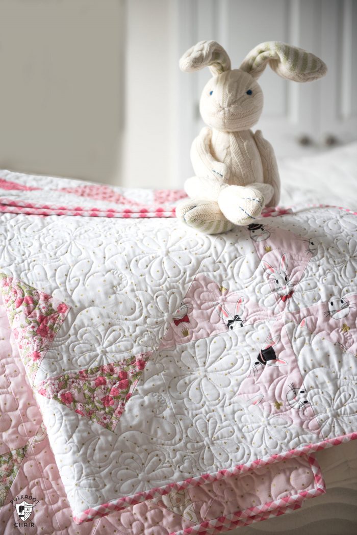 Pink and white baby quilt
