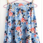 How to sew a half circle skirt with a zipper. A free sewing tutorial teaching you how to make a circle skirt out of seersucker or rayon. Such a cute summer DIY project!