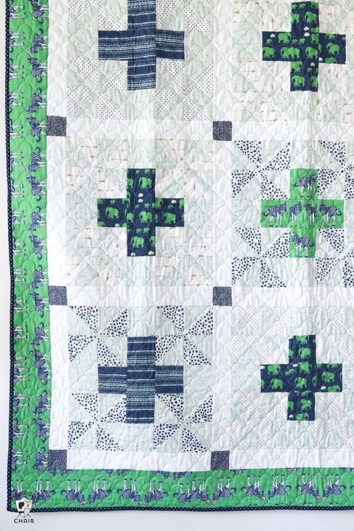 Patchwork Safari Quilt Pattern by Melissa Mortenson featuring Safari Party Fabrics, a cute take on a plus quilt pattern! Simple and fun!