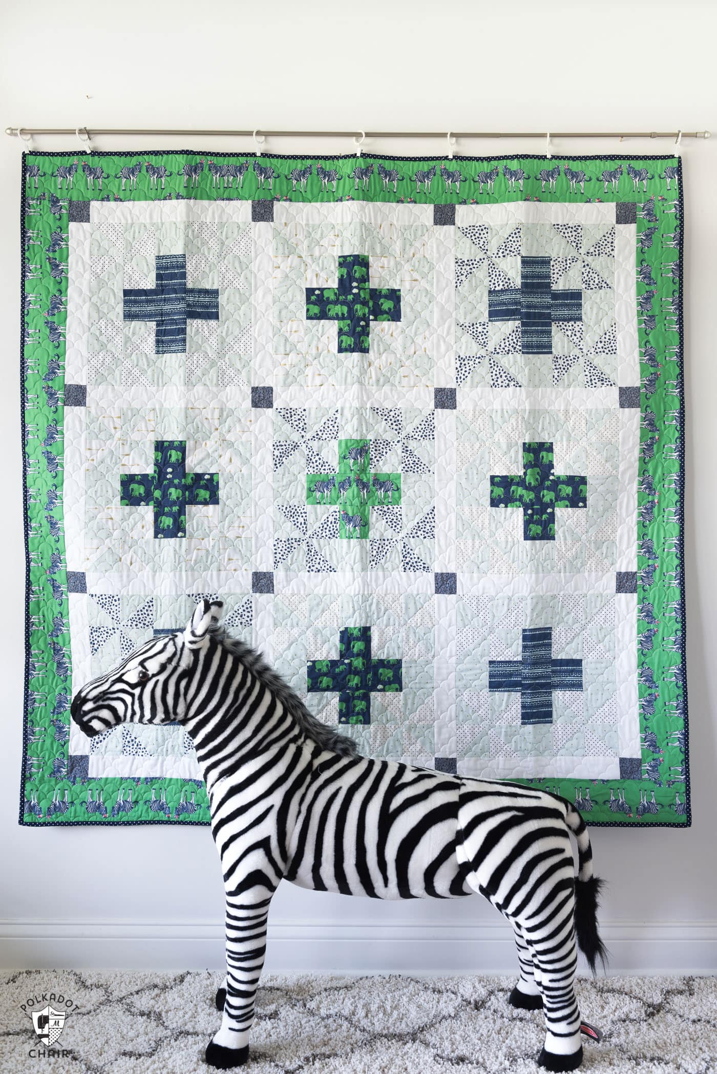 Patchwork Safari Quilt Pattern by Melissa Mortenson featuring Safari Party Fabrics, a cute take on a plus quilt pattern! Simple and fun!