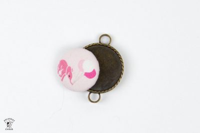 Fun and easy DIY Beaded Tassel necklace with covered button! Learn how to make a tassel necklace with this simple jewelry tutorial