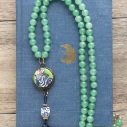 Fun and easy DIY Beaded Tassel necklace with covered button! Learn how to make a tassel necklace with this simple jewelry tutorial