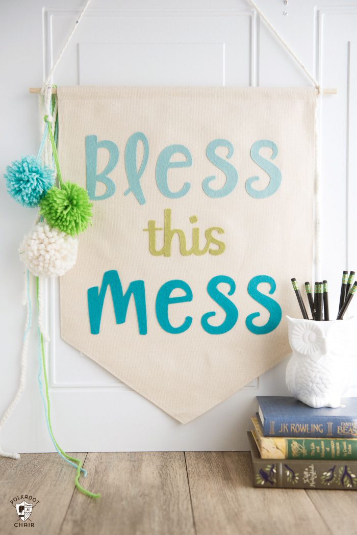 How to make a canvas banner with felt letters - such a cute DIY dorm room decorating idea!