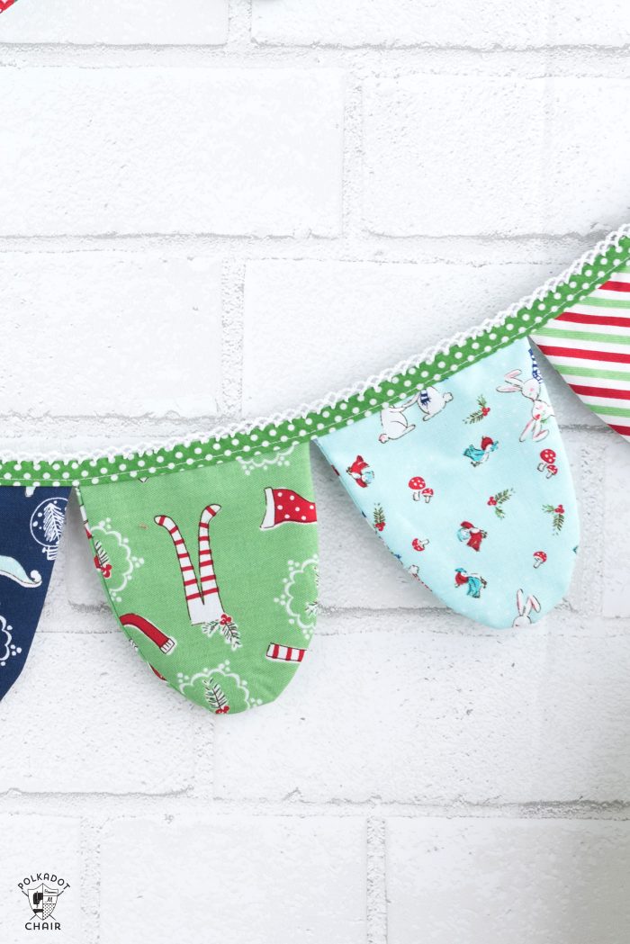 How to make a cute fabric banner for Christmas or any other holiday! A free project included with a Cricut Maker Machine.