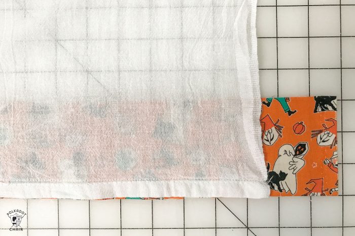 Free sewing tutorial for a DIY Halloween Tea Towel - such a cute project and a great way to use up fabric scraps! #halloween #halloweensewing #halloweengifts #gifts #giftideas #halloweenfabric #tutorial #sew #rileyblake #teatowel #diyteatowel #diydishtowel #dishtowel