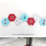 Super cute Christmas Hexie Tea Towel tutorial by Sarah Ashford. Such a fun Christmas gift idea ; learn how to sew hexagons! #christmasgifts #christmassewing #hexies #hexagons #hexagontutorial #christmasfabric #teatowel