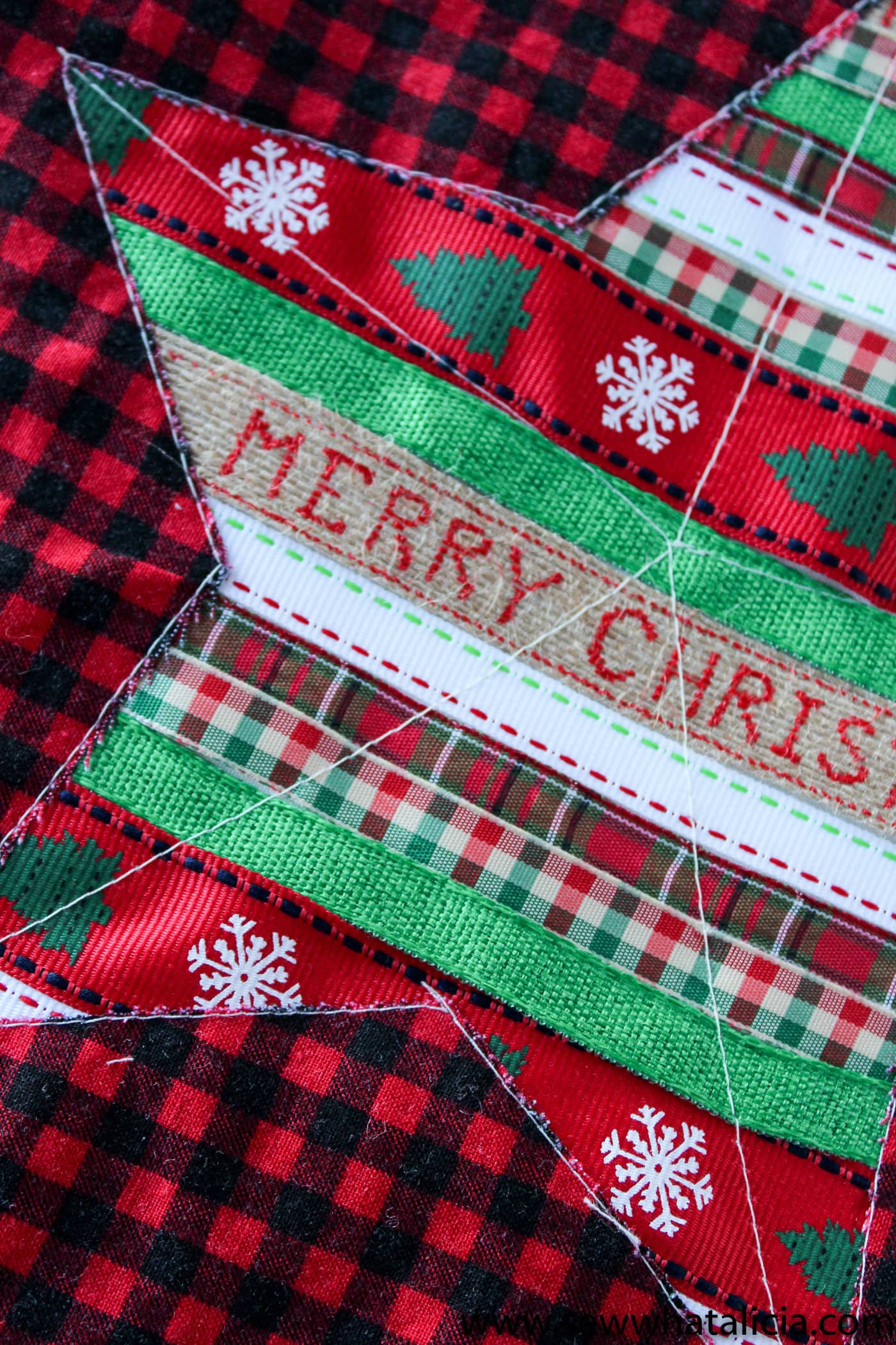 Free Reverse Applique Christmas Table Runner Pattern - such a cute and fun Christmas craft or sewing project #tablerunner #tablerunnerpattern #christmas #ChristmasDecor #ChristmasCraft #ChristmasProject