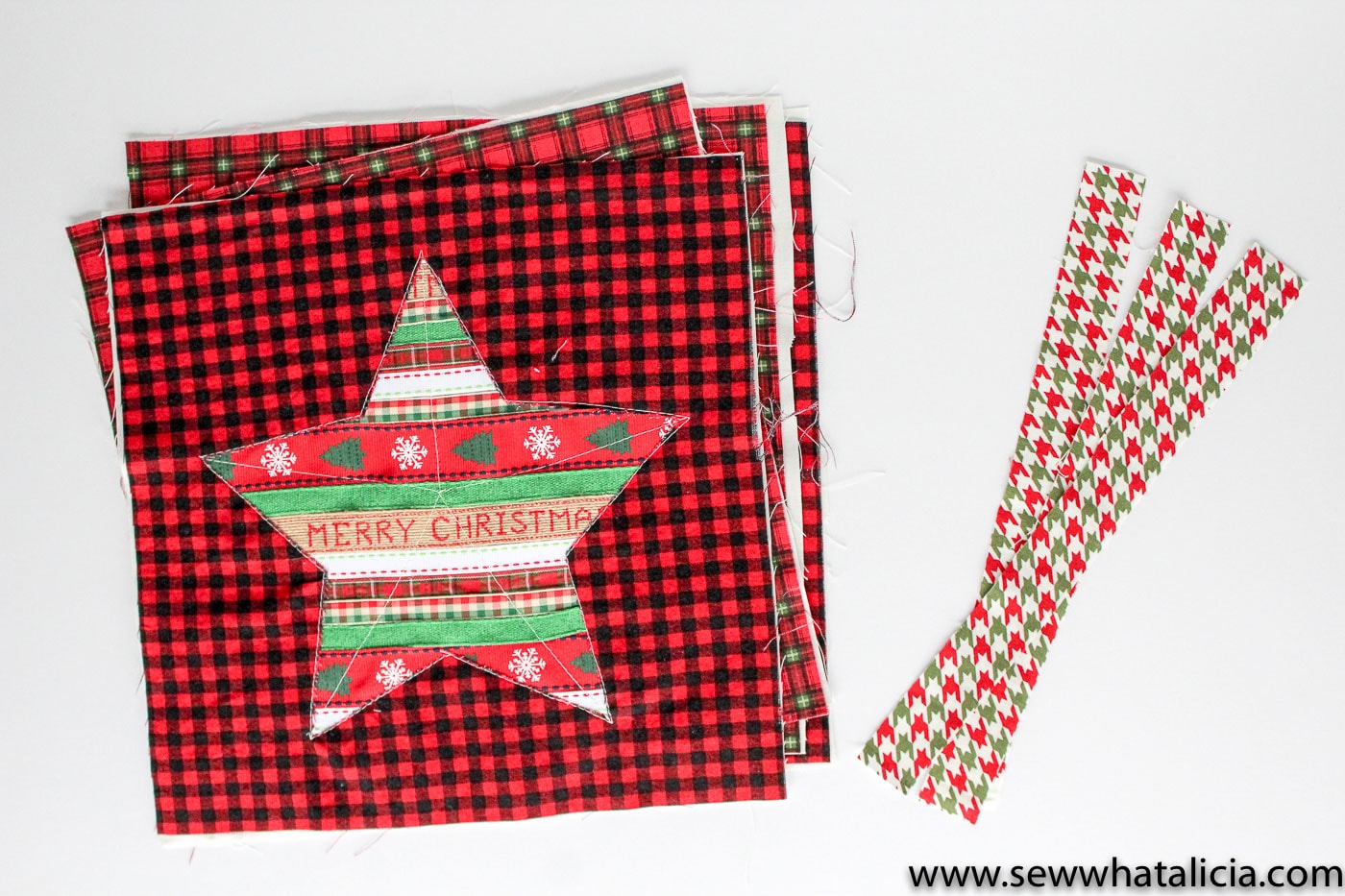 Free Reverse Applique Christmas Table Runner Pattern - such a cute and fun Christmas craft or sewing project #tablerunner #tablerunnerpattern #christmas #ChristmasDecor #ChristmasCraft #ChristmasProject