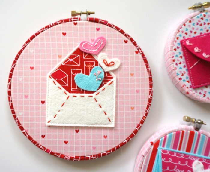 A free pattern for "Love Notes" a Valentine's Day Craft idea. A felt envelope tutorial - with hand embroidery and felt applique #ValentinesDay #ValentinesDayCraft #FeltEnvelope #FeltCrafts #FeltProject #EmbroideryHoopArt