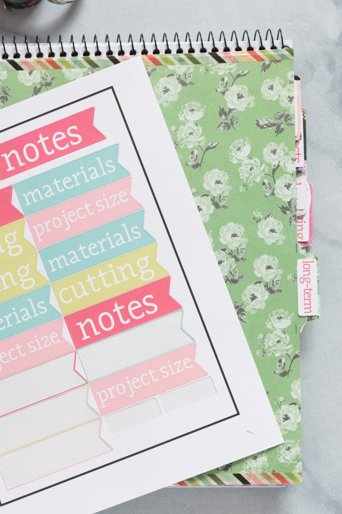 How to make a sewing and quilting planner, including how to make planner stickers using a Cricut print and cut feature. DIY Planner ideas! #projectplanner #diyplanner #diyplannerstickers #quiltplanner #diyquiltplanner #cricutmade