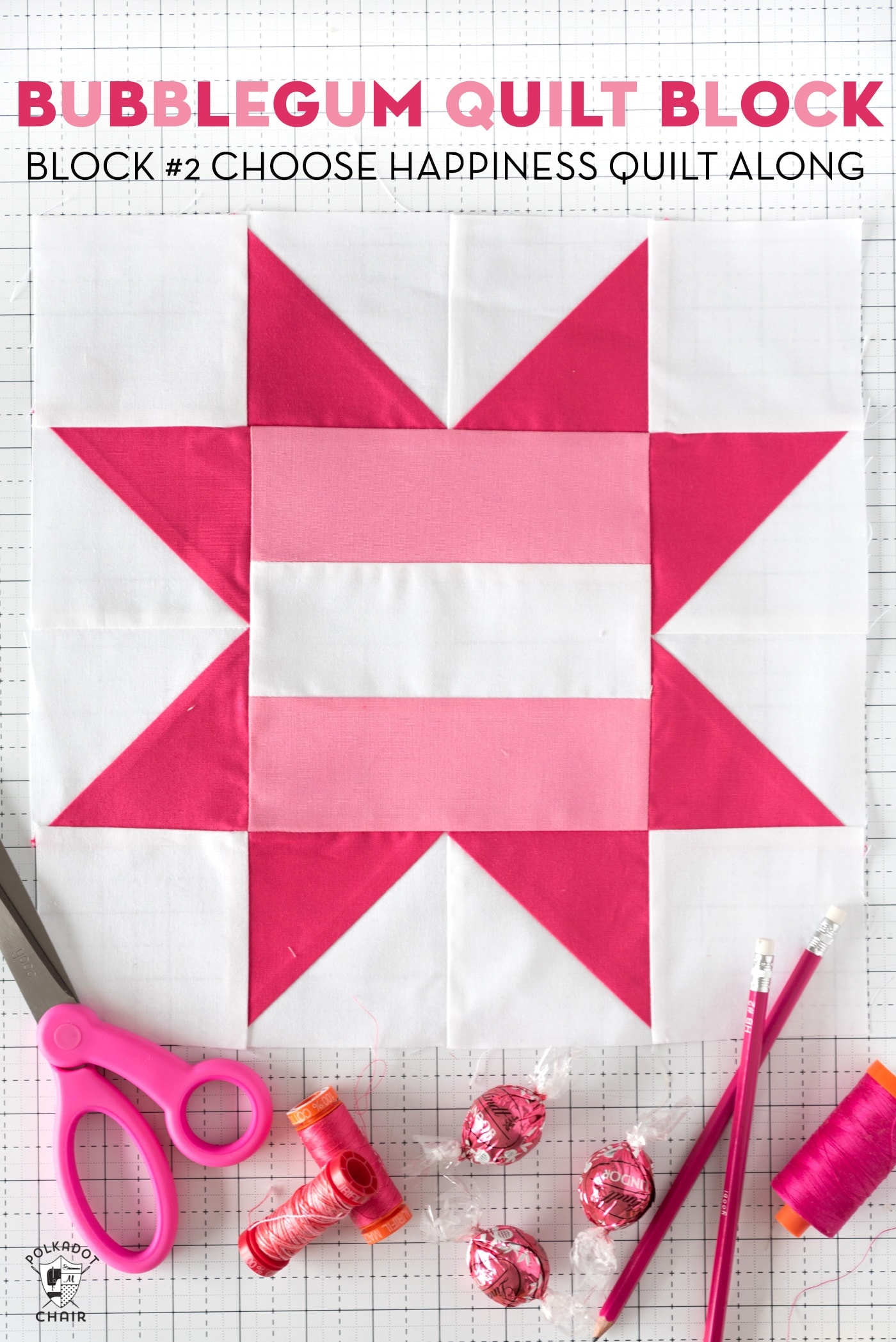 Light pink and dark pink Quilt block on white table.