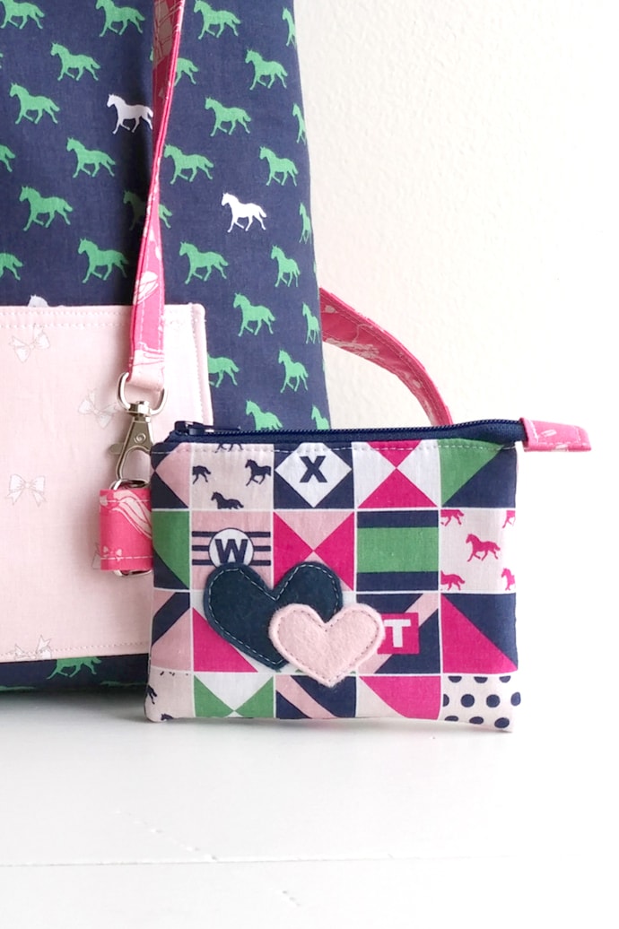 Learn how to sew a mini backpack with this cute toddler backpack pattern. Stitched up with Derby Day fabrics from Riley Blake Designs #minibackpack #toddlerbackpack #smallbackpack #backpacksewingpattern