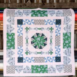 Learn how to make a medallion quilt; the Derby Days Medallion Quilt pattern, a free quilt pattern