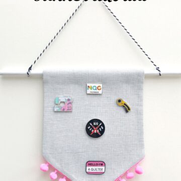 A great enamel pin display idea! Create a banner for your favorite pins with this DIY Enamel Pin Banner Tutorial. #enamelpins #sewingtutorial #pindisplayideas #bannertutorials #canvasbannertutorial