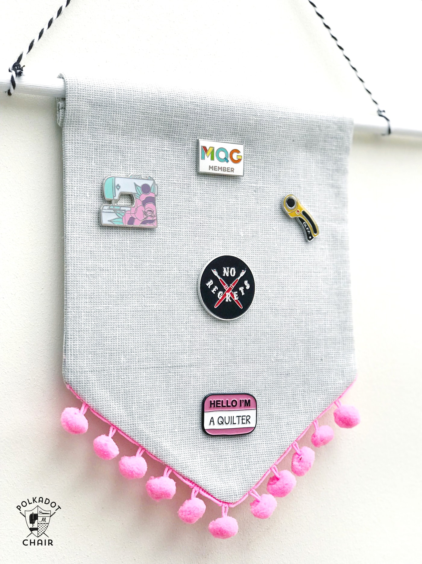 A great enamel pin display idea! Create a banner for your favorite pins with this DIY Enamel Pin Banner Tutorial. #enamelpins #sewingtutorial #pindisplayideas #bannertutorials #canvasbannertutorial