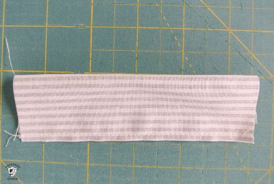 Big Bow Clutch; A DIY clutch purse pattern and free sewing tutorial. How to make an easy fabric clutch with a bow on the front. Fun sewing gift ideas.