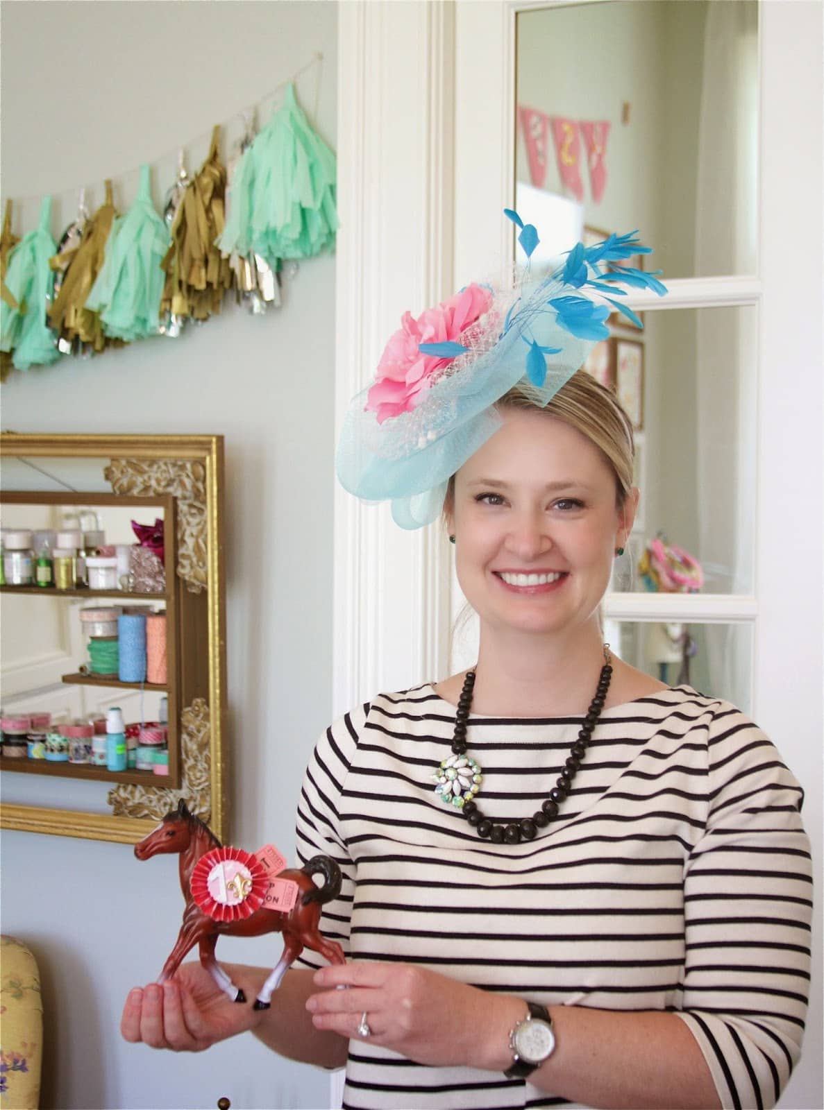 woman wearing derby fascinator