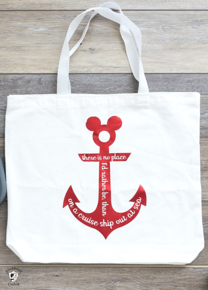 White tote bag with red Disney Cruise anchor and text