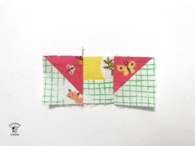 constructing the mini churn dash quilt block