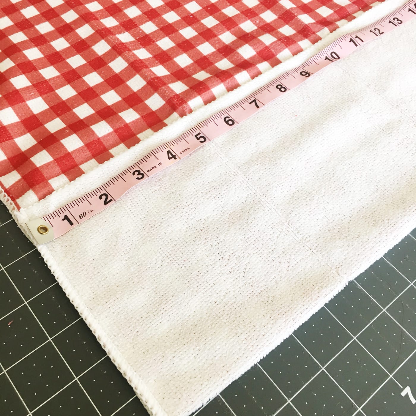 sizing the dishtowel to make the bbq apron