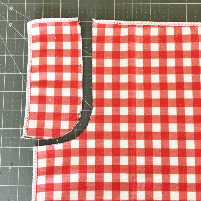 cutting out the towels to make apron