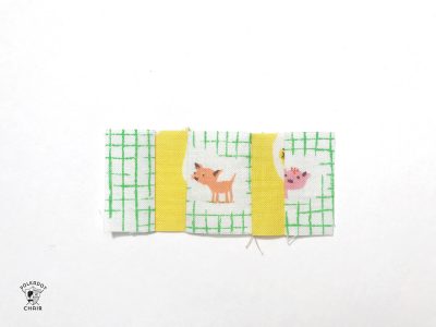 constructing the mini churn dash quilt block