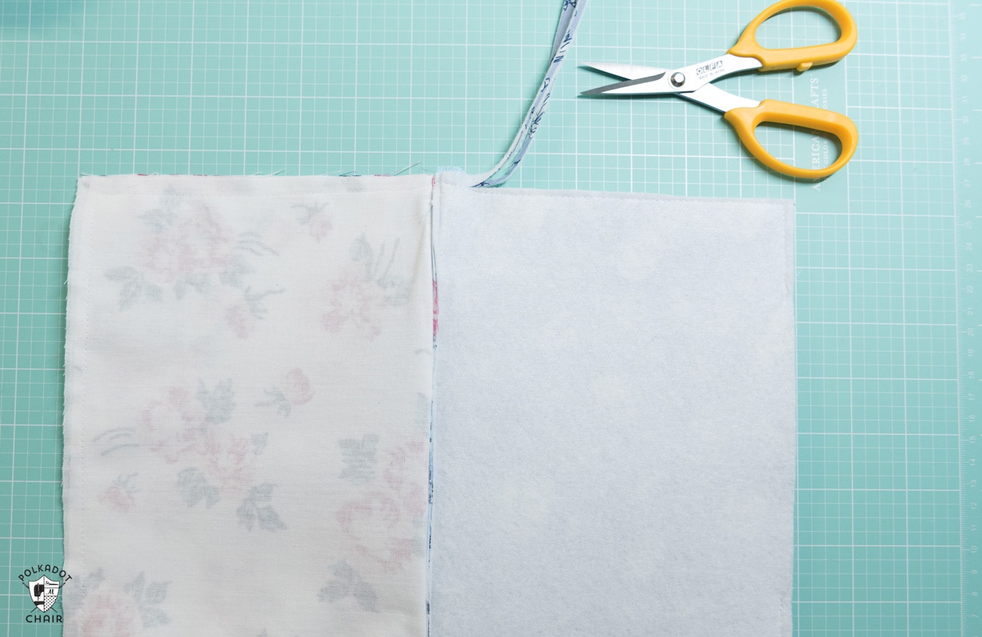 scissors zippered pouch tutorial in progress on cutting mat