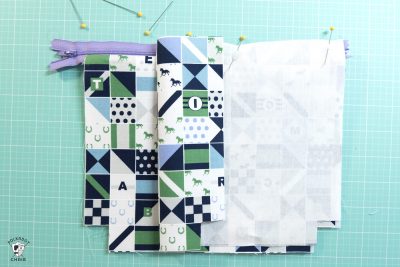 zipper pinned to fabric piece