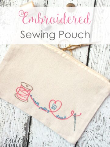 Hand embroidered zip bag on white tabletop