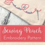 Hand embroidered zip bag on white tabletop