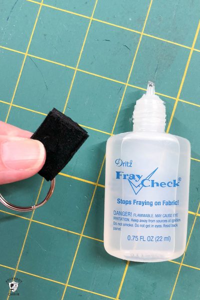 lip gloss case pieces on green cutting mat