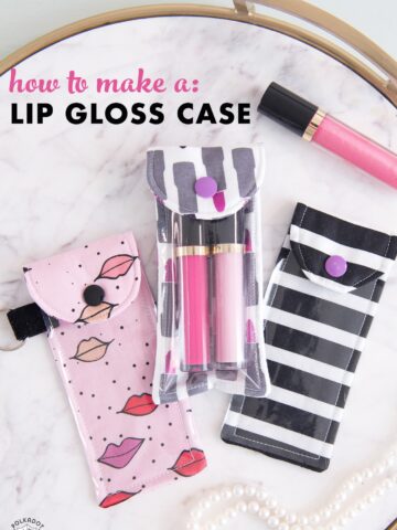 lip gloss pouch on marble tabletop