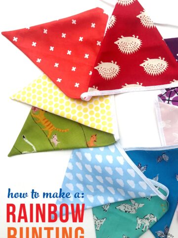 rainbow flag bunting on white tabletop