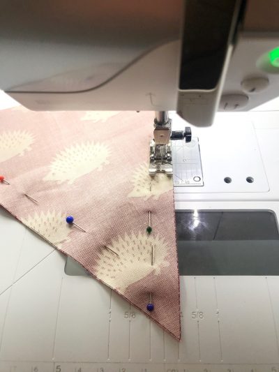 rainbow flag bunting on white tabletop