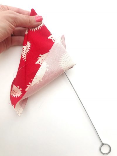 rainbow flag bunting on white tabletop