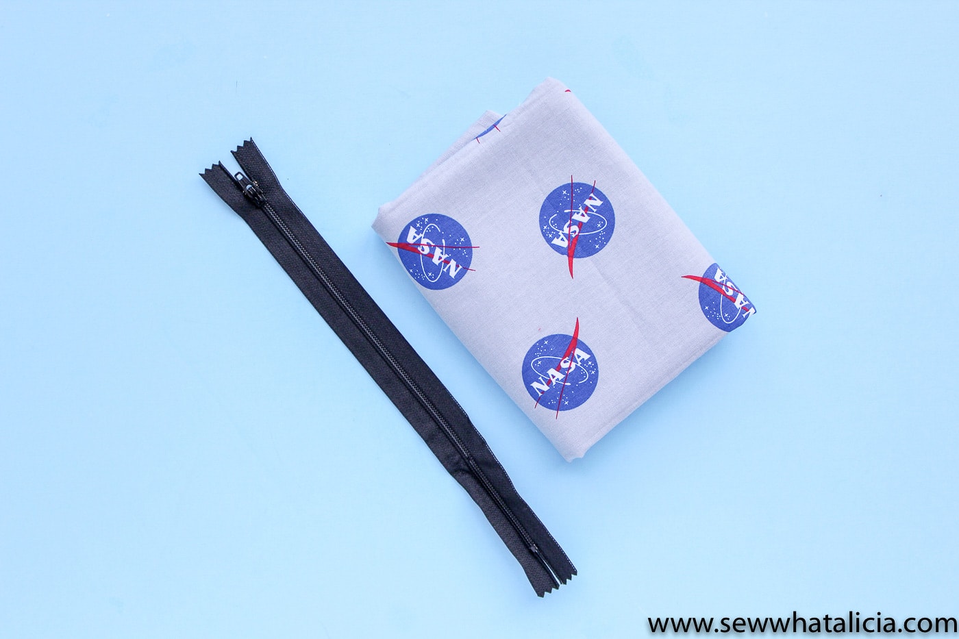 NASA pencil pouch on blue background