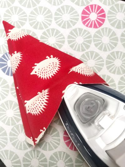 rainbow flag bunting on white tabletop