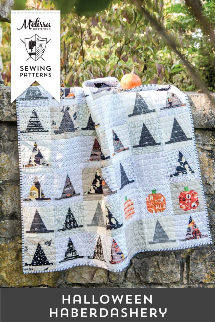 halloween witch hat quilt on stone wall