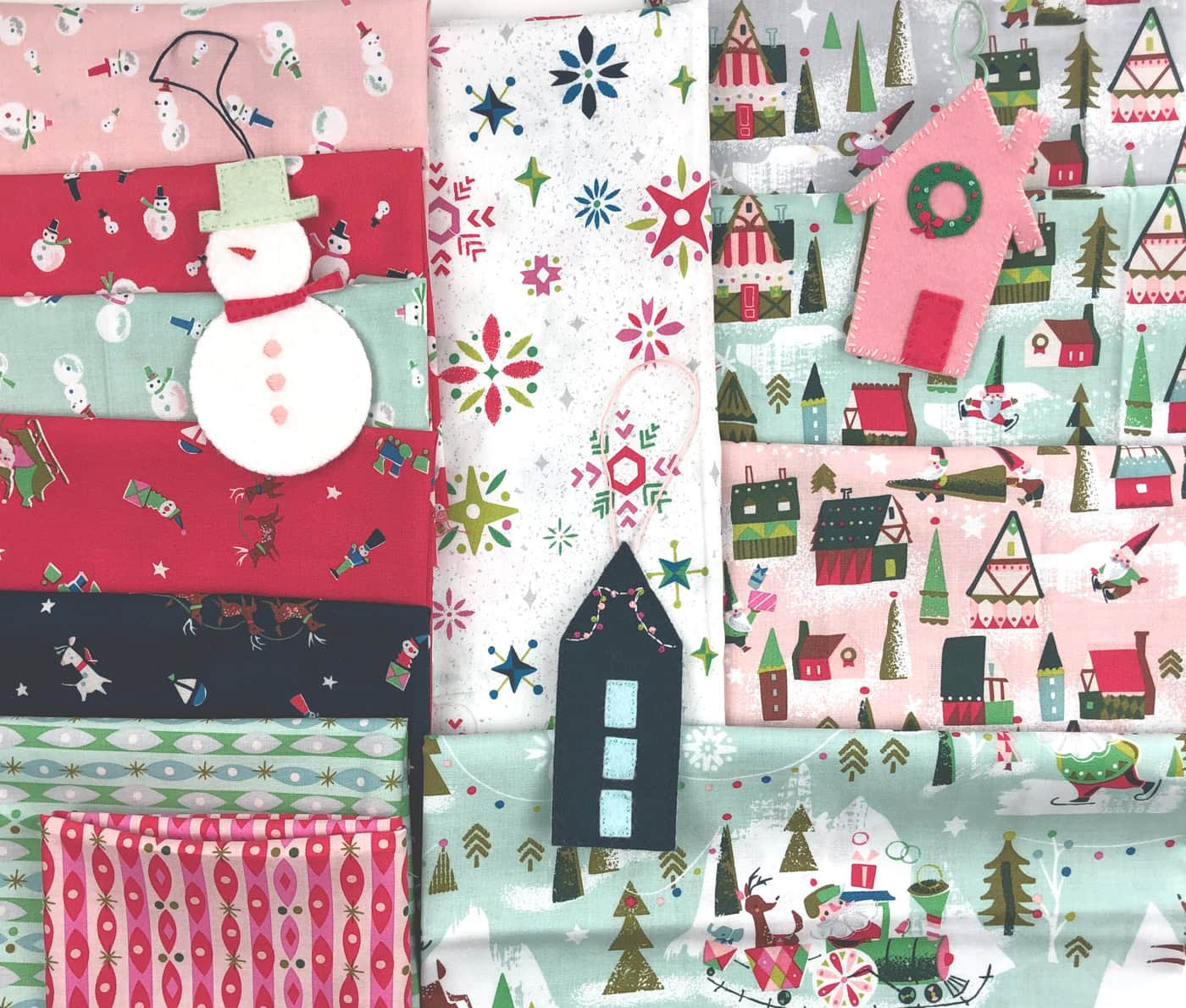 Christmas themed fabric with ornaments on top.