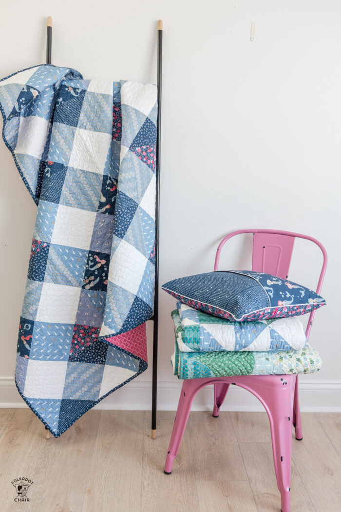 Gingham quilt pattern on white wall
