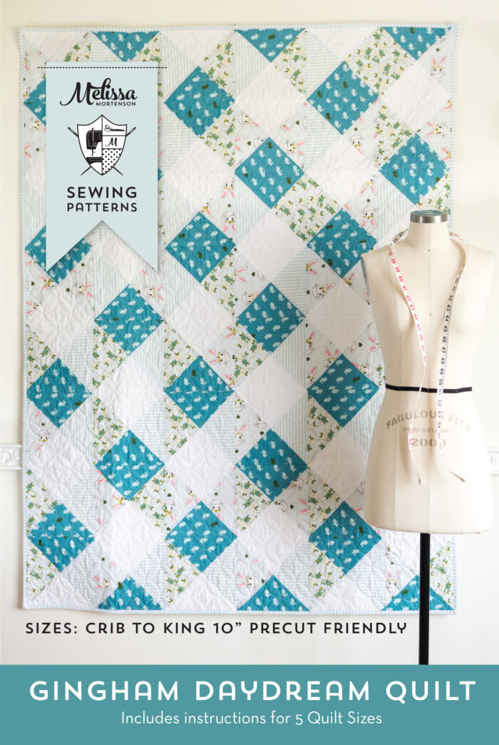 Gingham quilt pattern on white wall