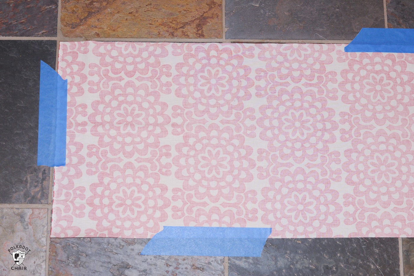 fabric taped to the floor
