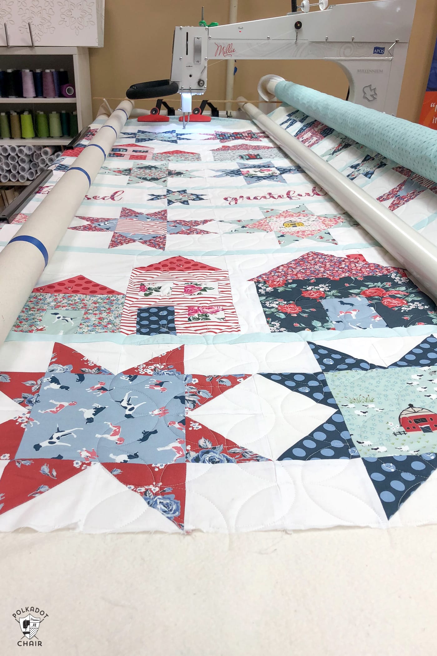 red, white an blue quilt on longarm quilt machine