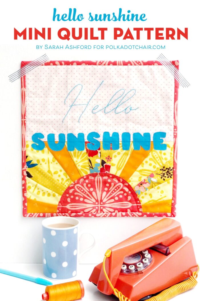 Hello Sunshine Mini quilt on white wall