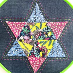 English Paper Pieced Star Block in embroidery hoop