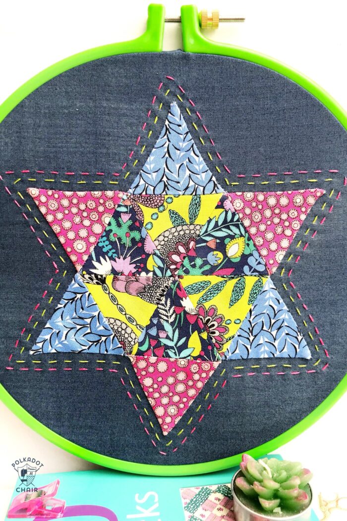 English Paper Pieced Star Block in embroidery hoop